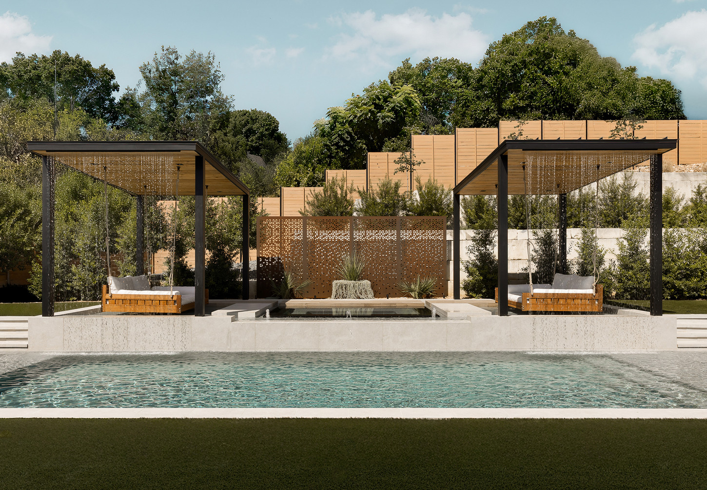 Outdoor pool loungs swings with waterfalls