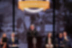 PHOTO: University of Tennessee System President Randy Boyd provides remarks at the opening ceremony of UT Martin’s 125th anniversary celebration Oct. 10 in the Phillip W. Watkins Auditorium. Also speaking at the event were (seated, l-r) Ashlee Mallon, student trustee on the UT Board of Trustees and a junior finance major at UT Martin; Bud Grimes, vice chancellor for communications and marketing, who emceed the event; Dr. Sandy Mehlhorn, Faculty Senate president and professor of agricultural engineering; Chancellor Yancy Freeman Sr.; and Art Sparks, chair of the UTM Advisory Board. Dr. Chandra Alston, former vice chancellor for human resources at the UT Health Sciences Center and a UTM alumna, also spoke at the program.