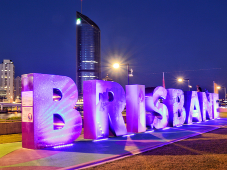 Brisbane city sign at night – article on infrastructure recruitment in Brisbane and project delivery talent