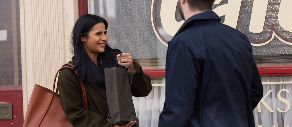 Adam hands Alya an expensive gift as she prepares to leave for Dublin in Corrie