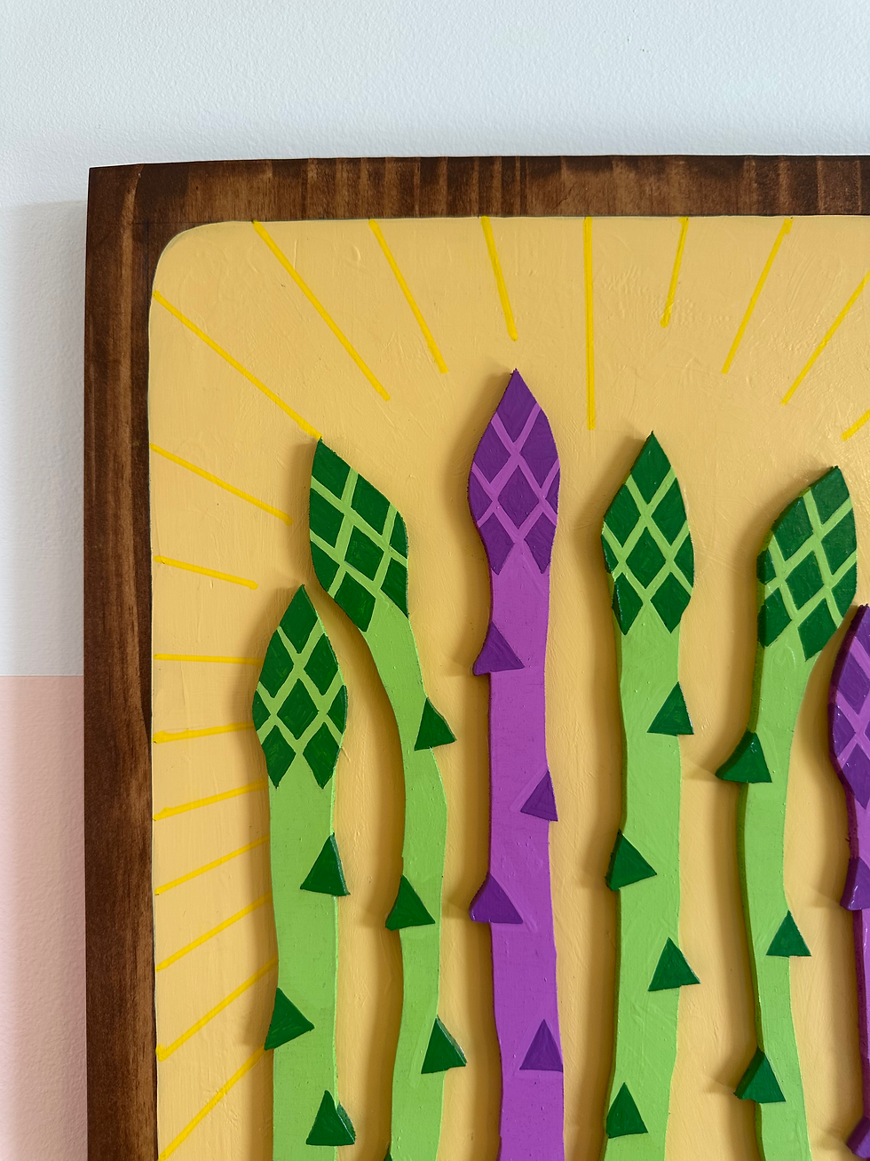 Thumbnail: Green and purple asparagus artwork on yellow background with wooden frame.