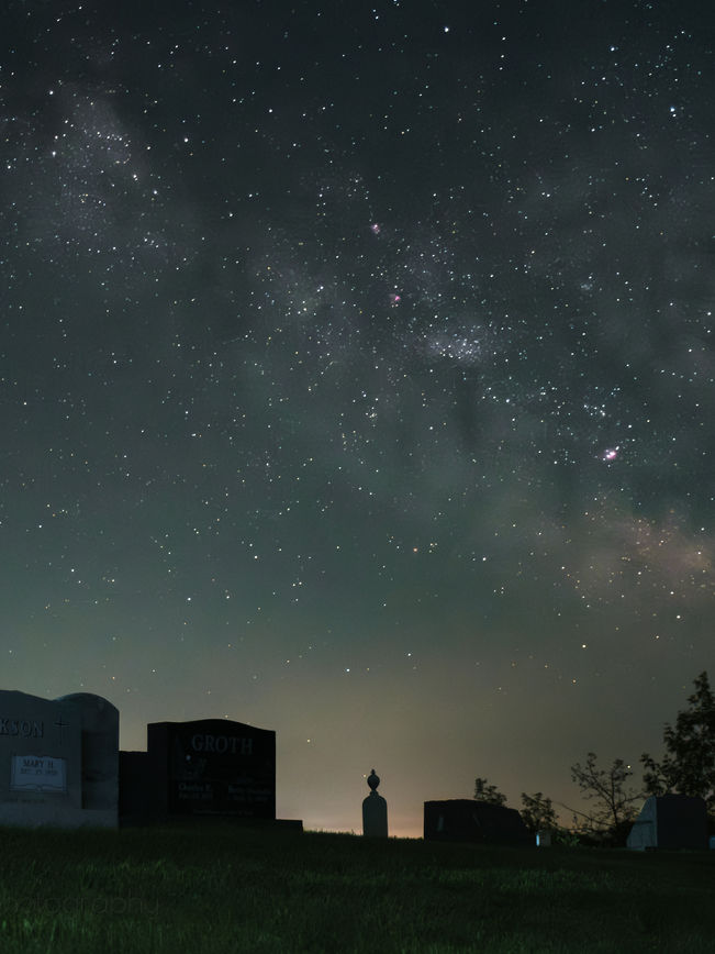 milky way over cemetery