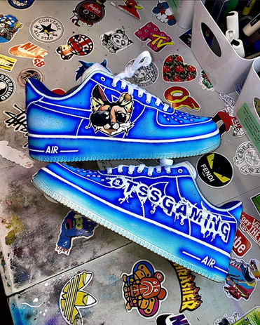 A customized pair of Nike Air Force Ones in blue