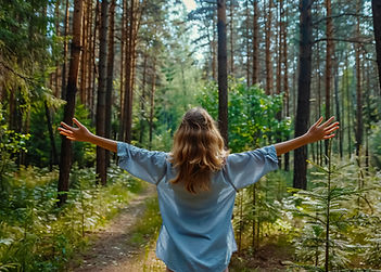 woman-spreading-her-arms-forest-from-back-view-balance-spirituality.jpg