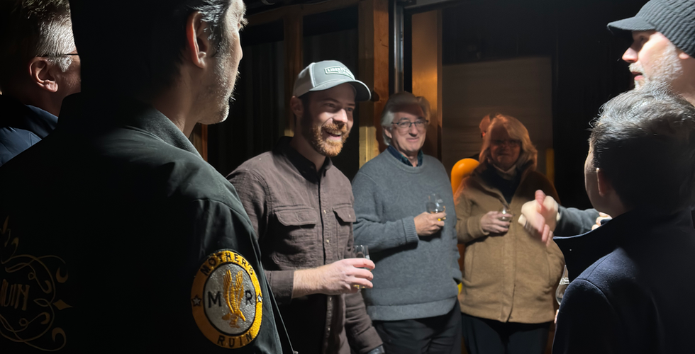 Kevin Hough in the rickhouse at Liberty Pole Spirits with the Vintage Whiskey Society