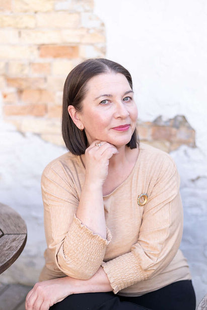 photo of Michelle Sponseller sitting with hand under chin
