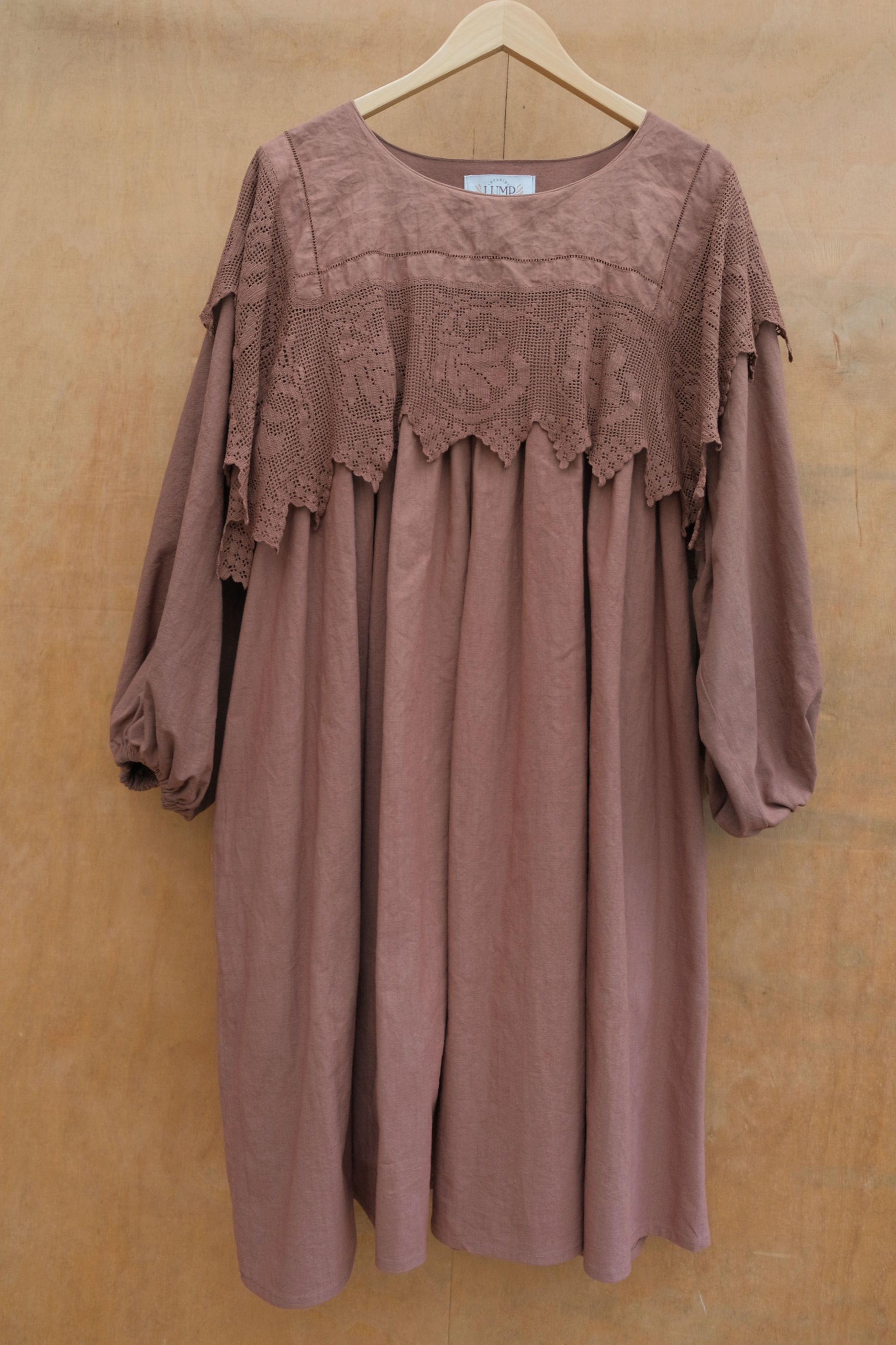 Brown colored dress with crocheted lace