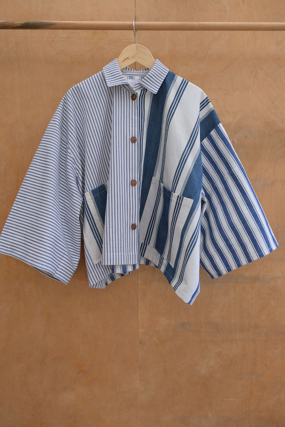 Jacket with a mix of blue stripes