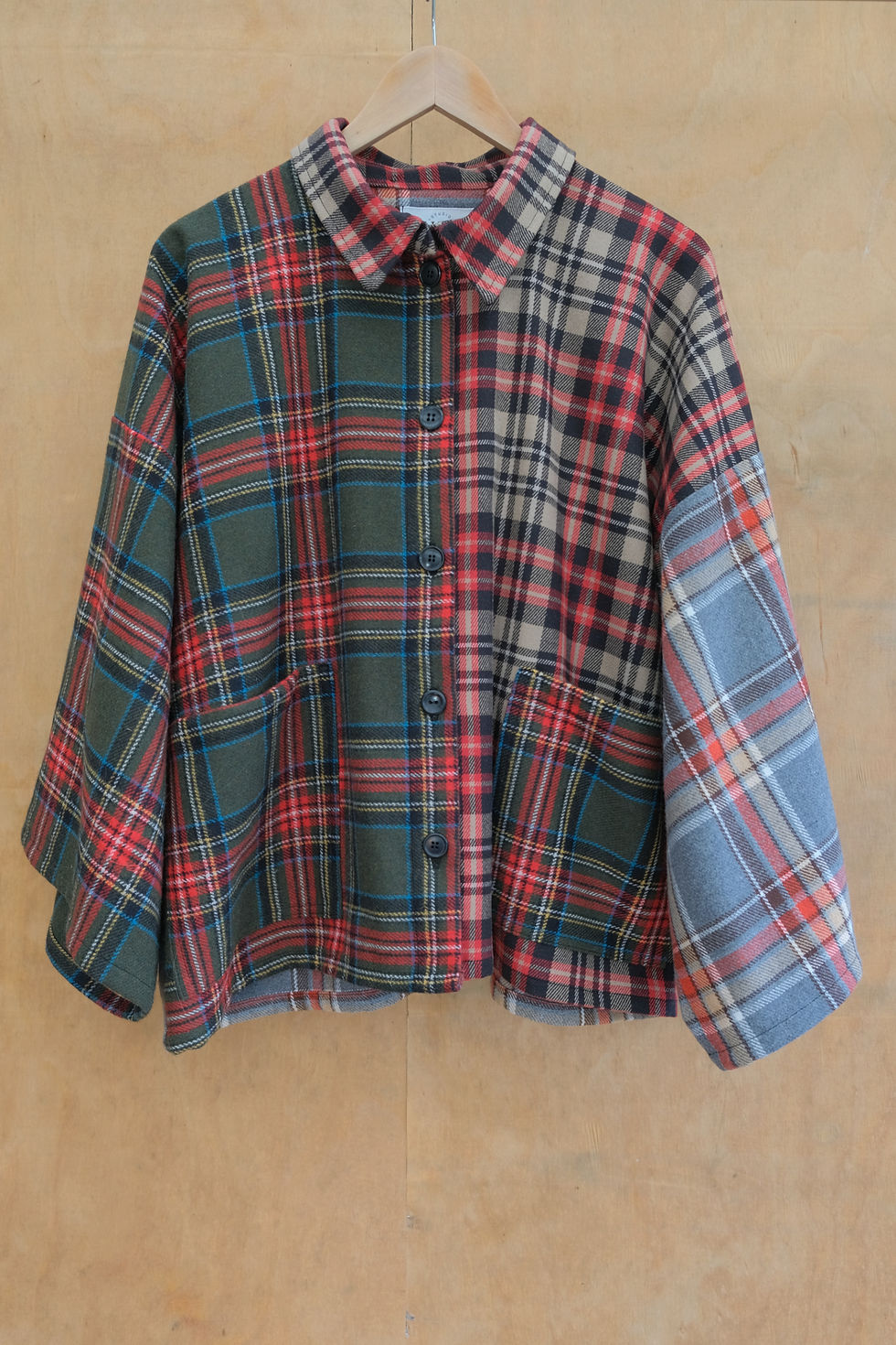 Wooljacket with mixed checked fabrics