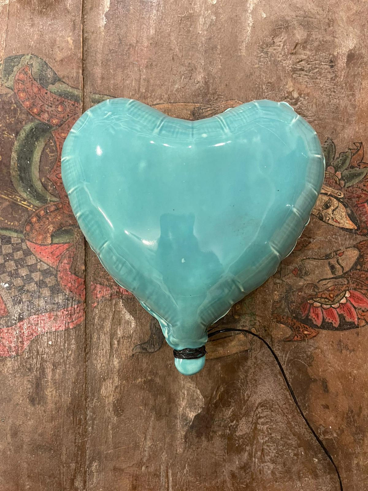Turquoise glossy ceramic heart balloon sculpture handmade for wall installat