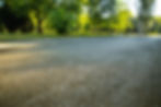 the-road-way-in-the-city-park-with-trees-and-grass-2025-02-24-17-12-40-utc.jpg