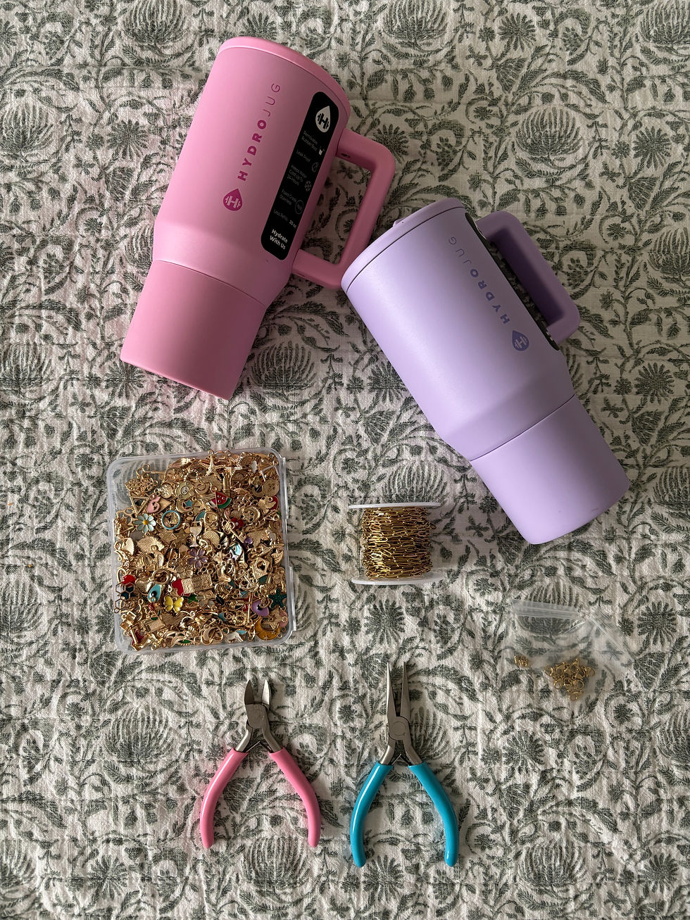 Pink and purple kids HydroJugs and DIY supplies for water bottle charms.