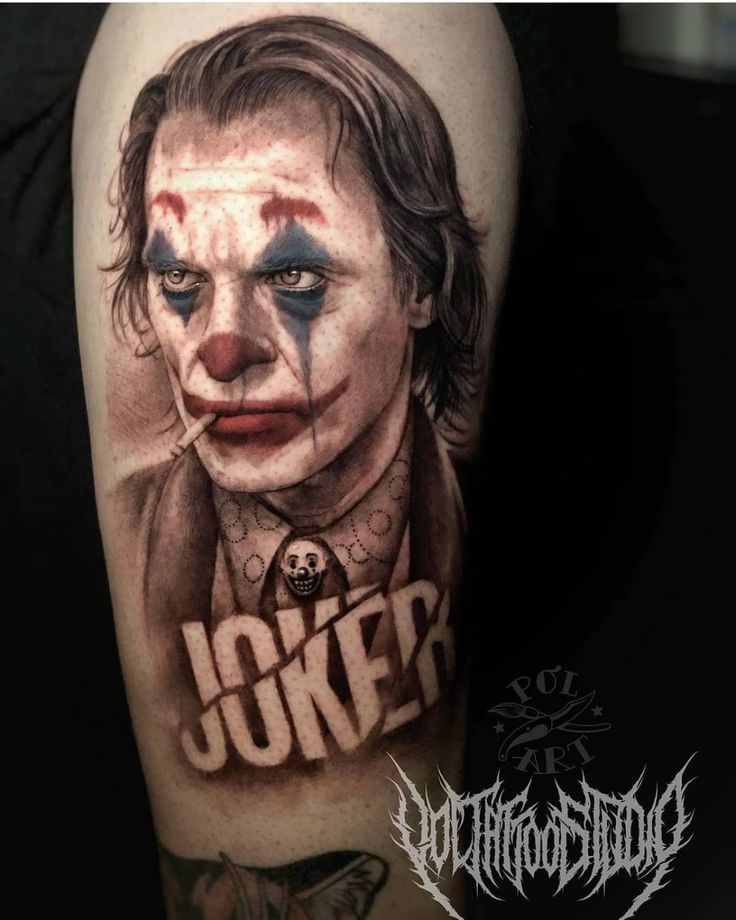 Joker tattoo with crown madness power