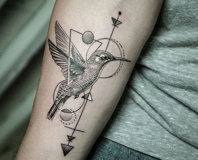  Colorful bird tattoo design on a branch