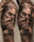 Ouroboros Zeus tattoo reign cycle — infinity bolt loop blackwork bicep eternal rule
