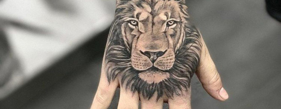 Tatuagens na mão