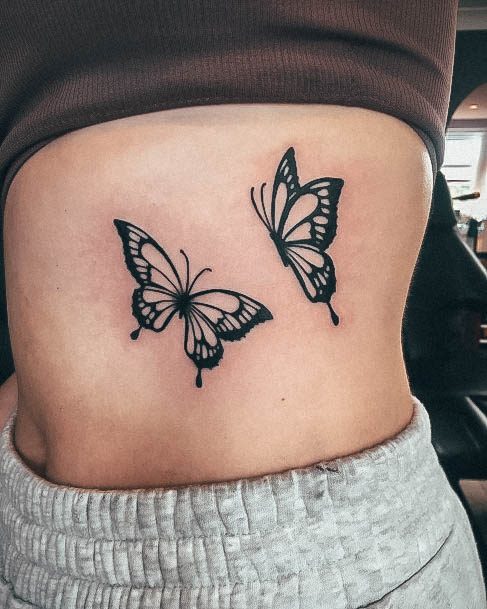 Tatuagem Feminina na Barriga