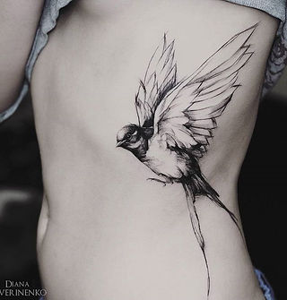  Colorful bird tattoo design on a branch