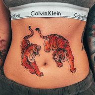 Tatuagem Feminina na Barriga