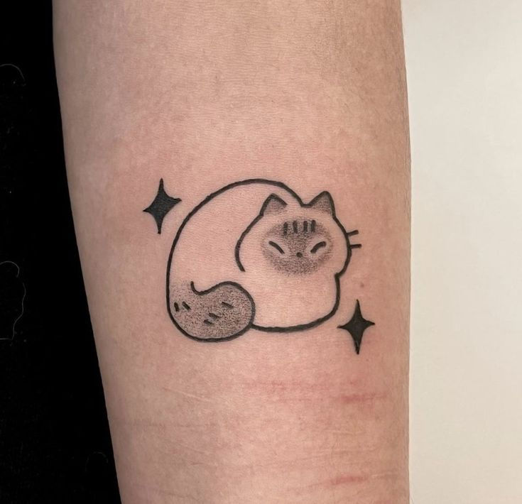 Cat tattoo with flowers botanical design