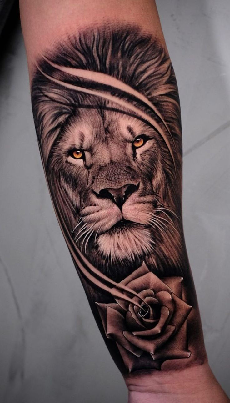 Lion tattoo with mane flowing majestic