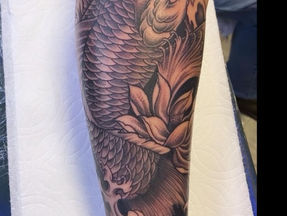 Black Koi Tattoo: Ideas, Meaning and Design