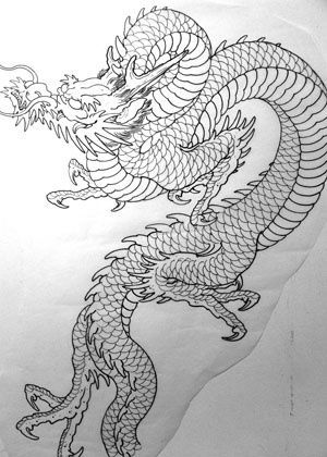 Biomechanical dragon with metallic armor plates