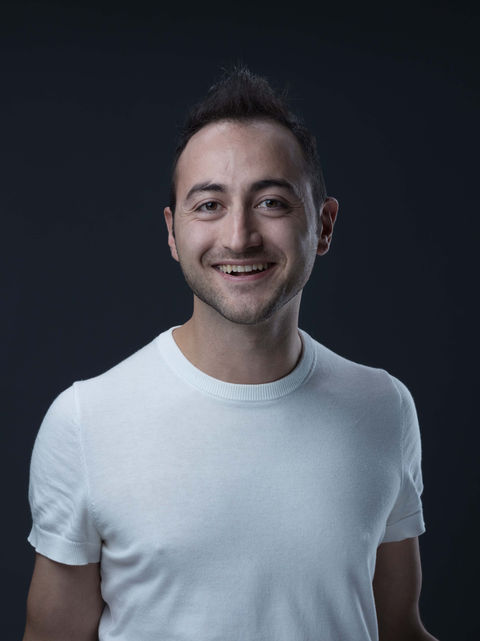 Smiling man in a white t-shirt