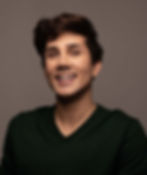Headshot of a man, smiling
