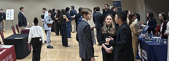 Traditions Wealth Advisors representatives networking with students at Texas A&M Economics Career Night