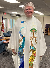 Pastor Dave in alb and stole.jpeg