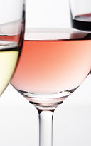 Glasses of white, rosé, and red wine.
