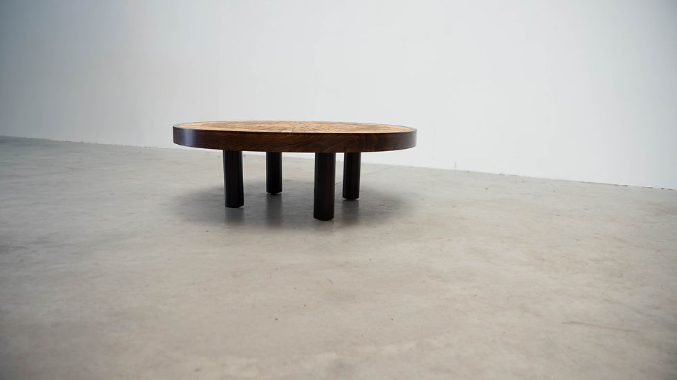 Thumbnail: Round coffee table by Roger Capron