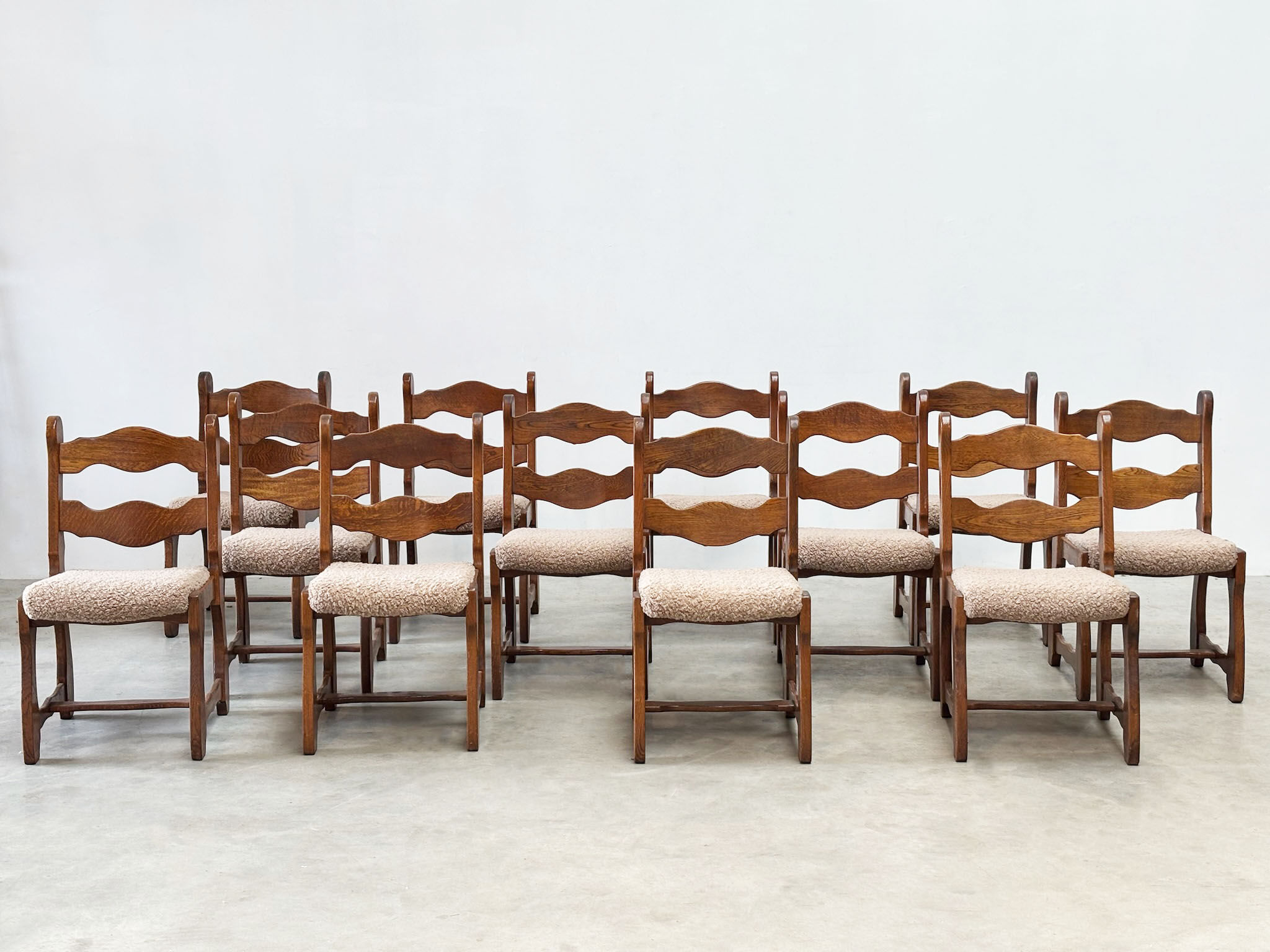Set of 12 brutalist razorback dining chairs