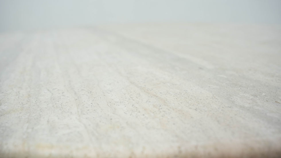 Thumbnail: Round Belgian travertine dining table