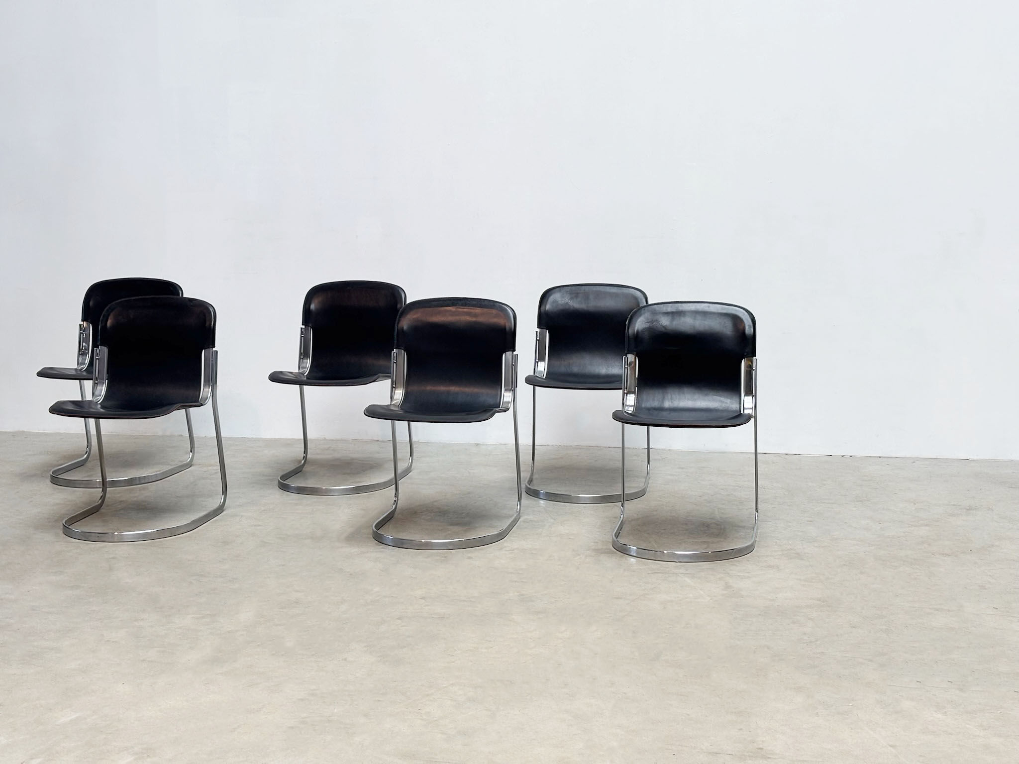 Set of six black leather Willy Rizzo dining chairs