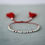 Thumbnail: red tassel bracelet