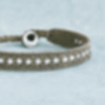 Handwoven bracelet with sterling silver rectangle beads and silver button closure