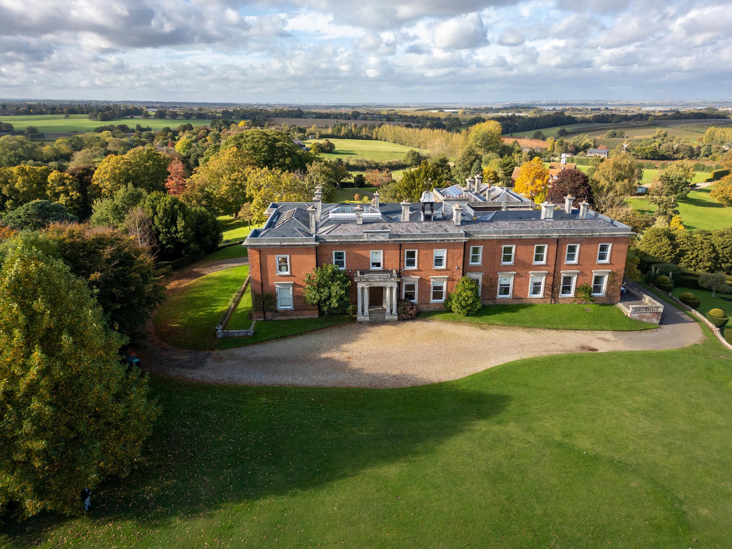 A breathtaking view of the lush greenery and manicured lawns at Mount Ephraim Gardens in Kent.