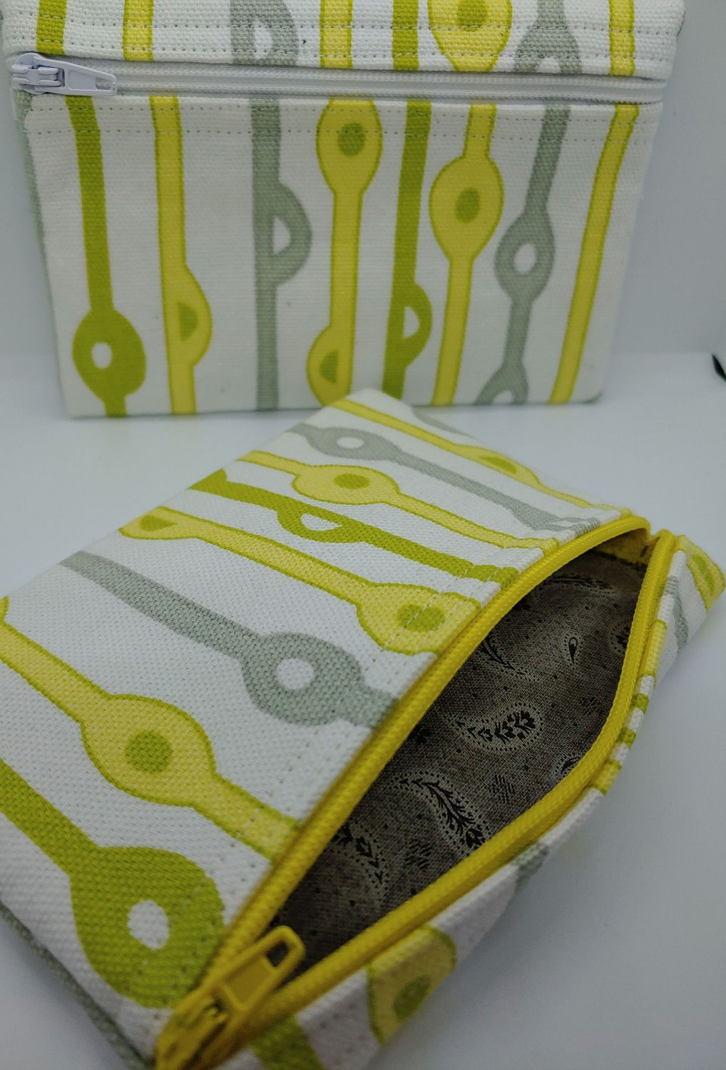 Striped pouch with gray and yellow
