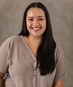 Warm Studio Portrait of Smiling Woman.png