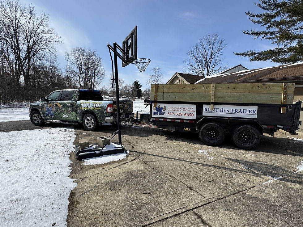Big Boy Services rental trailer and company truck.