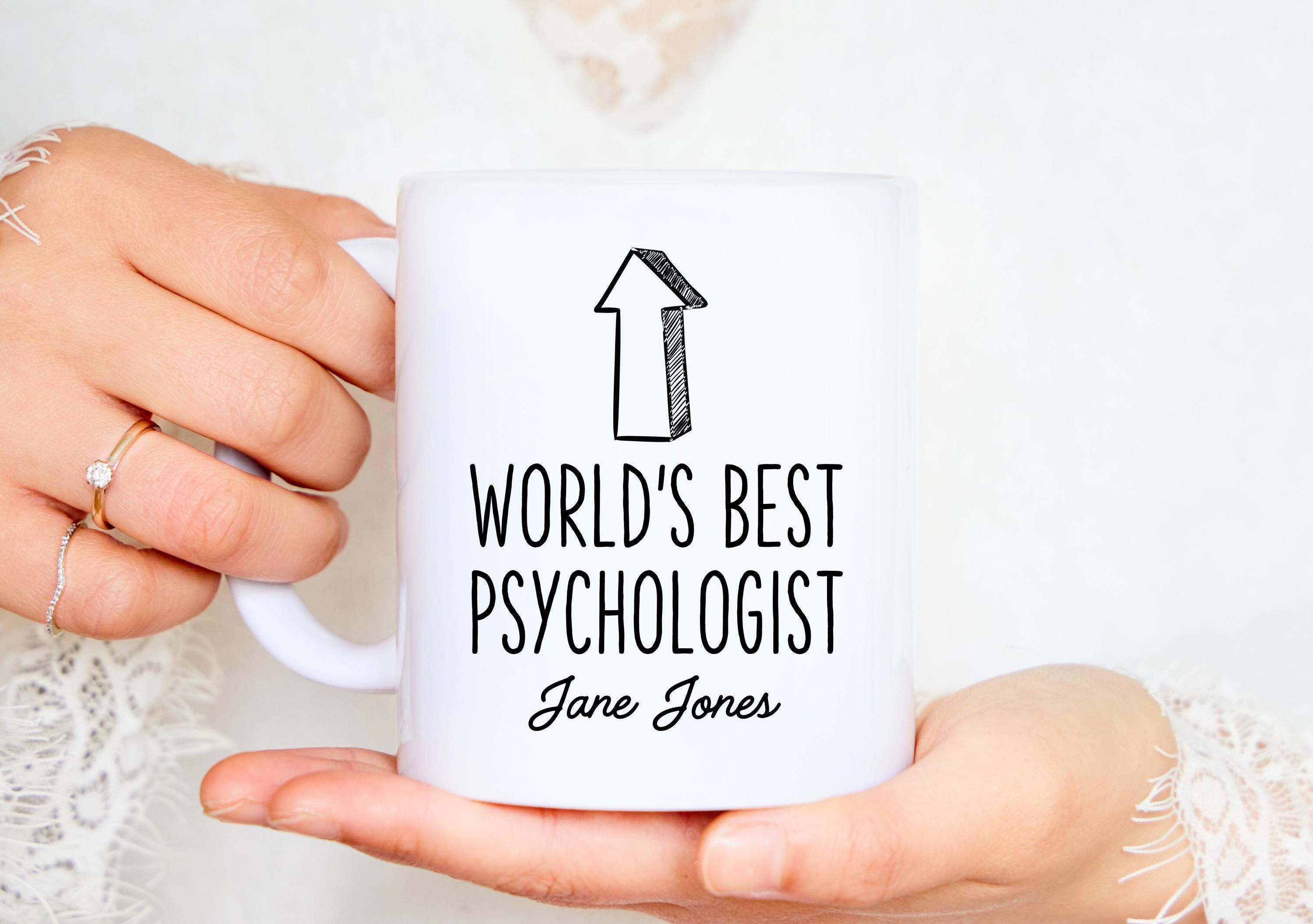 Woman holding Psychologist Arrow Mug mockup