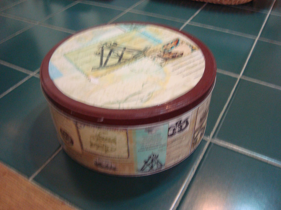Thumbnail: Two round tin boxes - "Compasses" & "Rabbit"