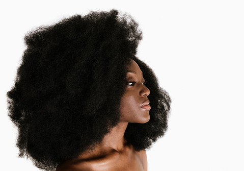 black-woman-wearing-hair-in-afro-SBI-346270854.jpg