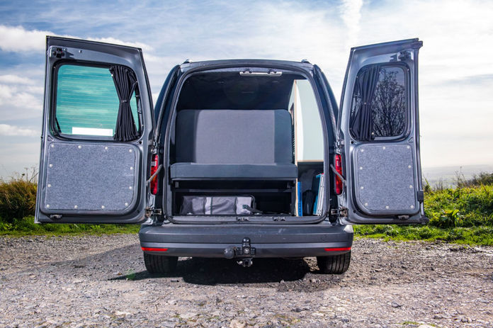 Fully lined carpet Volkswagen Caddy conversion removable panels barn doors