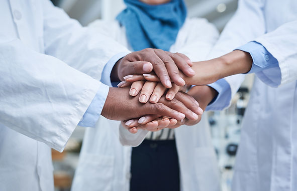 PeopleImages "Staff teamwork hands" February 17 2021