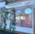 The Flawless Guru Aesthetics Clinic storefront with floral decor