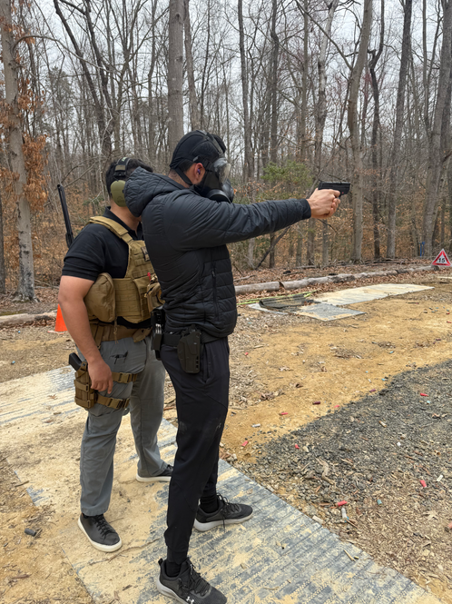 Certified trainers conducting hands-on readiness instruction with professional clients