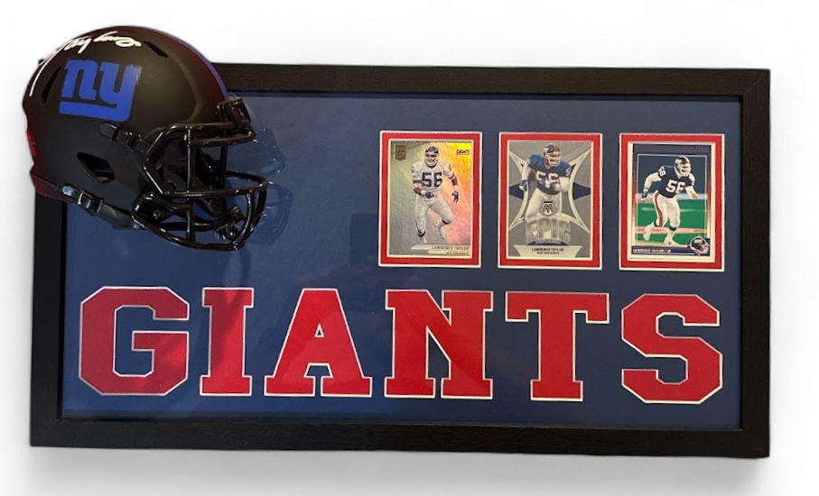 Thumbnail: Close-up of sports cards in Lawrence Taylor New York Giants framed memorabilia display